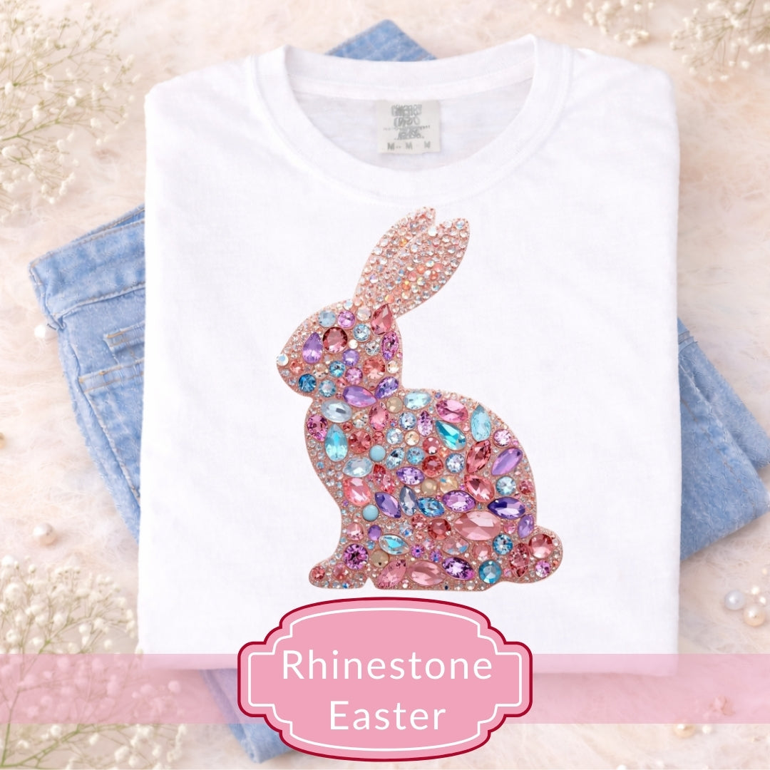 White t-shirt with a rhinestone Easter bunny design on a light background