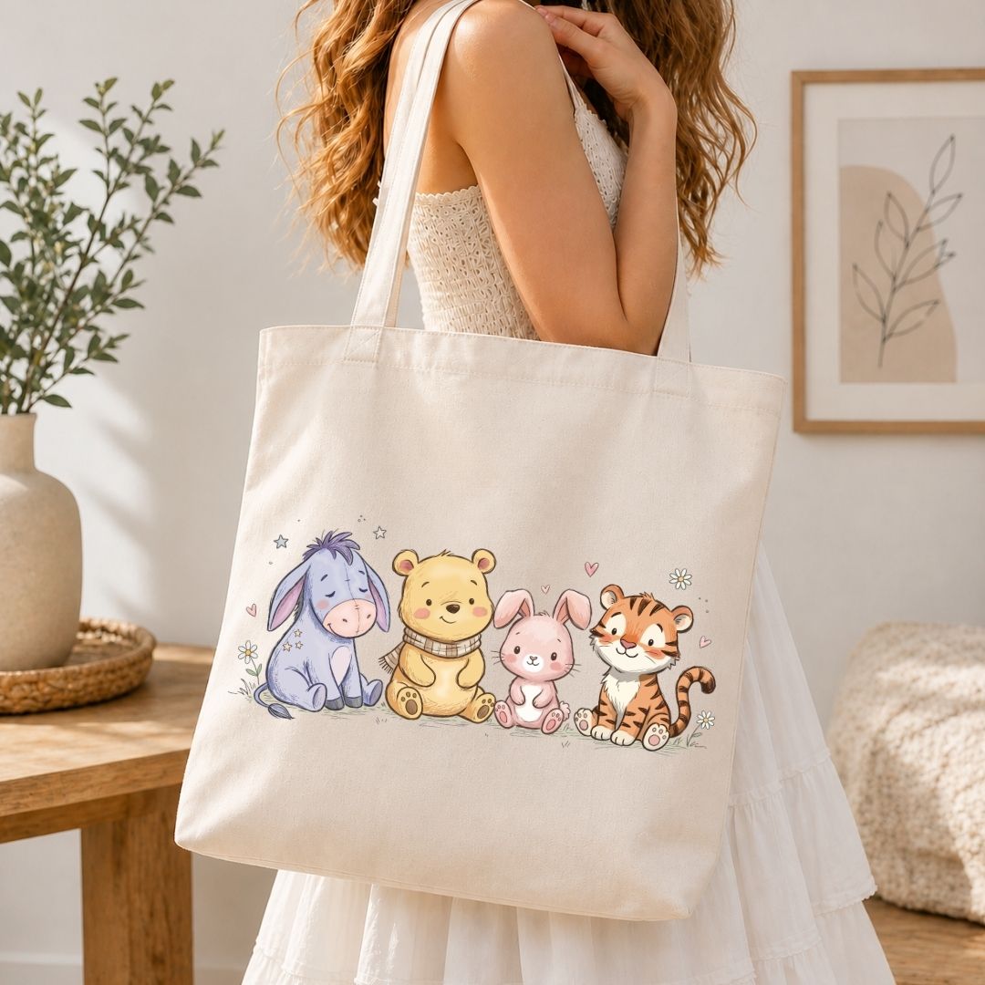 Person holding a tote bag with cartoon characters in a home setting