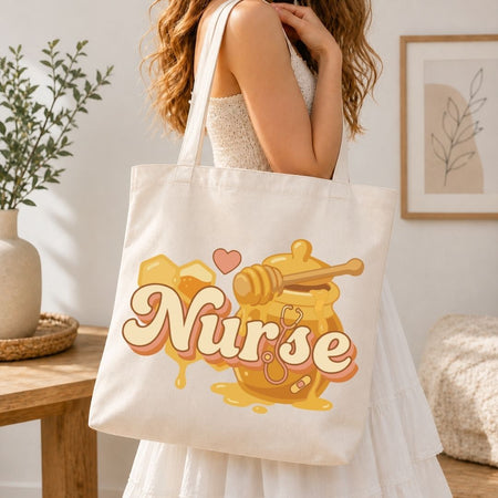 Person holding a tote bag with 'Nurse' design in a home setting