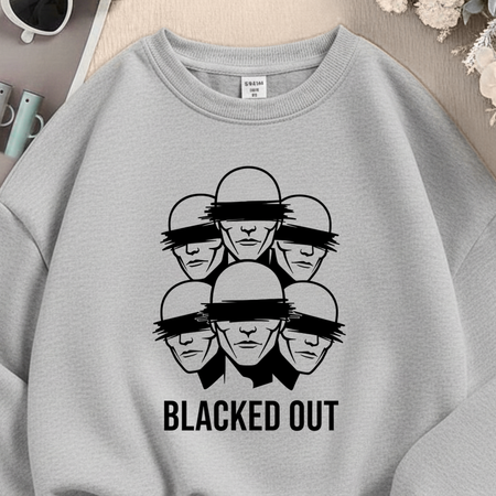 Gray sweatshirt with black graphic design and 'BLACKED OUT' text on a neutral background