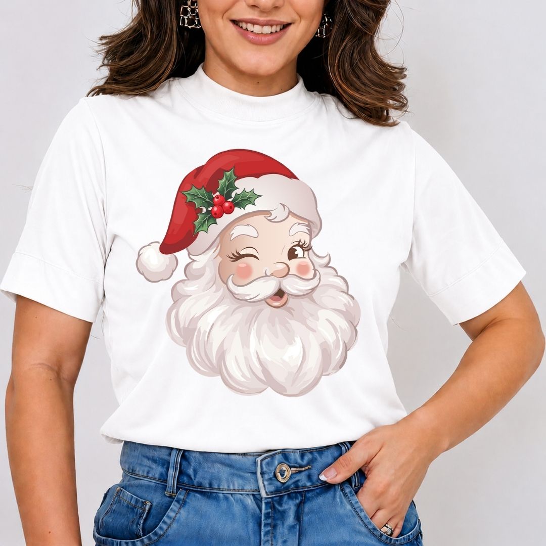 A woman wearing a white short-sleeve t-shirt with a large graphic of a smiling Santa Claus face on the front, paired with blue jeans.