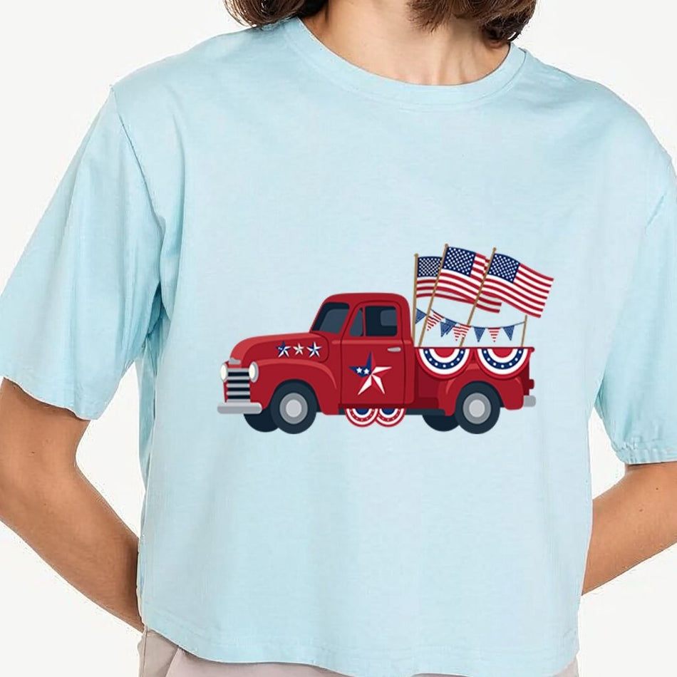 Light blue t-shirt with a red truck and American flags design.