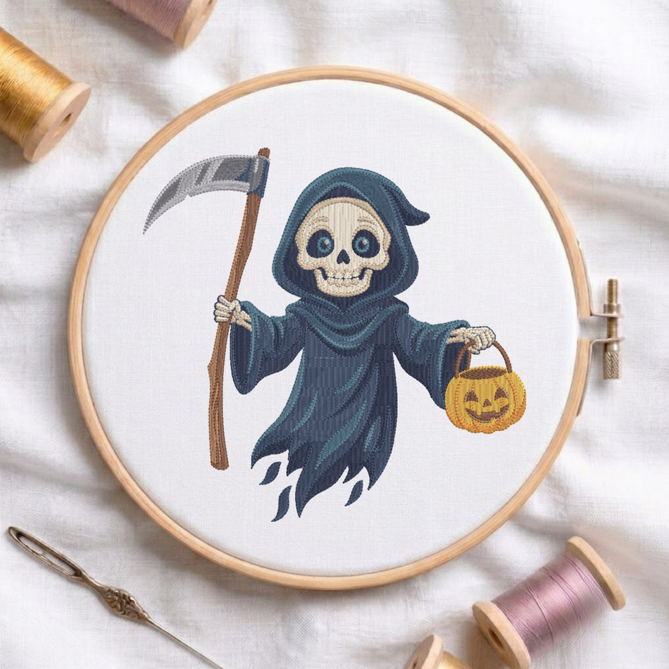 A circular embroidery hoop displays a stitched design of a skeleton in a dark blue hood holding a scythe and a jack-o'-lantern bucket. The hoop is styled on a white fabric background with spools of thread, a needle, and wooden embroidery hoops.