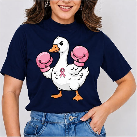 Close-up mockup of a woman wearing a dark navy blue t-shirt printed with a cartoon duck wearing pink boxing gloves and a breast cancer awareness pink ribbon.