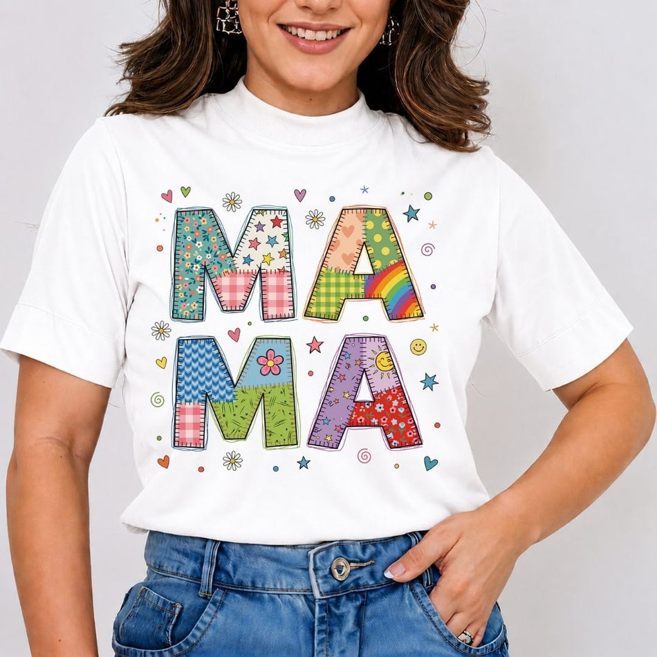 Person wearing a white t-shirt with colorful 'MAMA' text design on a plain background