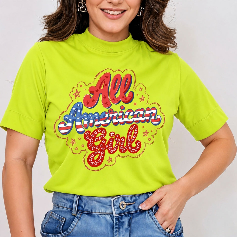 A woman wearing a bright neon yellow t-shirt with a retro-style 'All American Girl' graphic in red, blue, and white, paired with blue jeans.