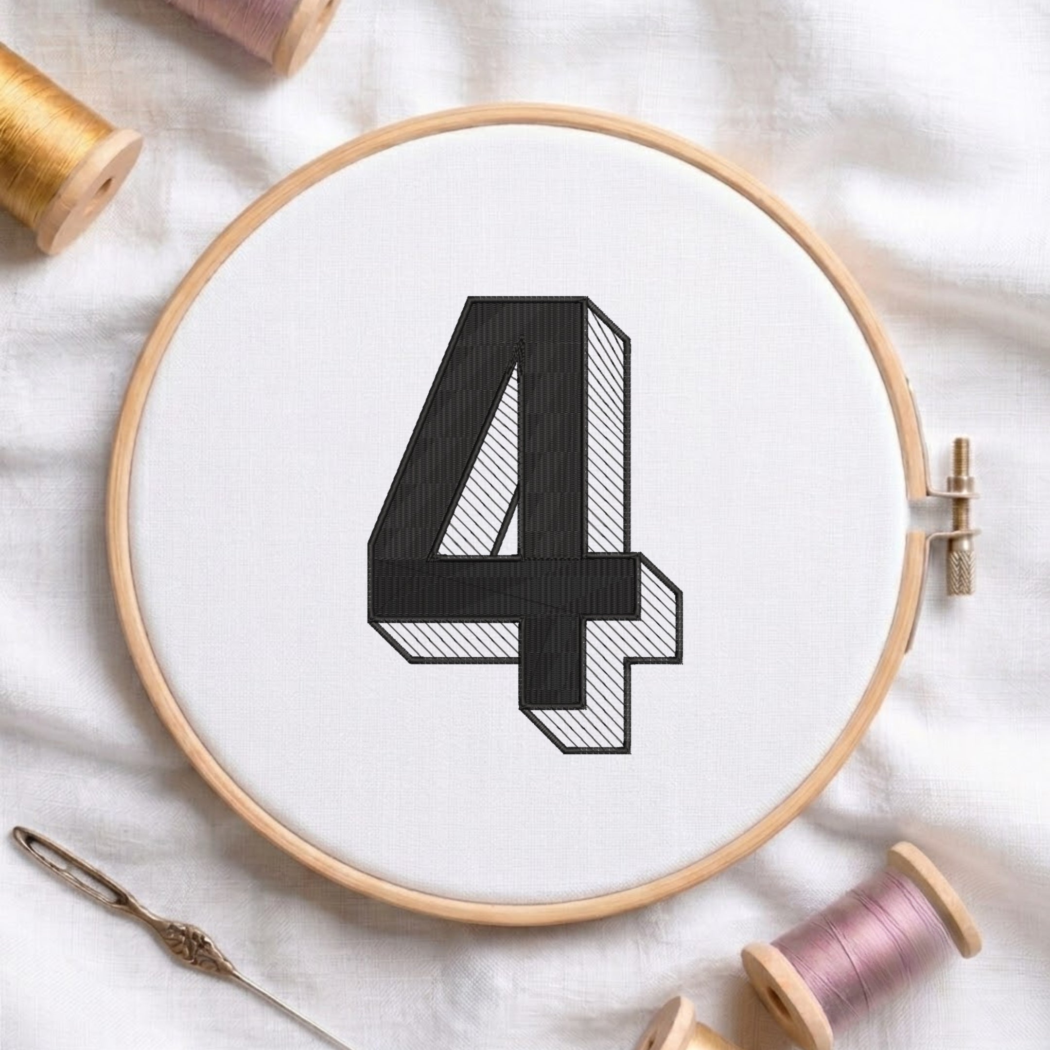 An embroidered 3D block number "4" with striped shading texture, stitched inside a wooden hoop on white fabric with sewing threads.