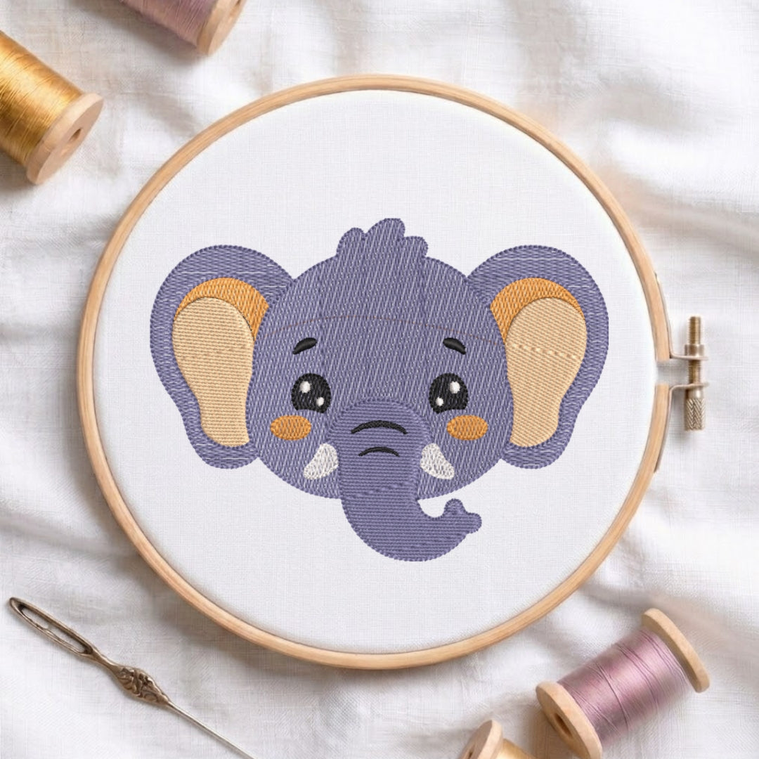 Embroidery hoop with a completed purple elephant design on a white fabric background.