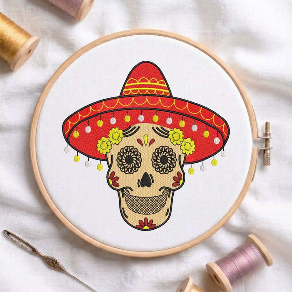 Embroidered Dia de los Muertos sugar skull wearing a red sombrero inside a wooden hoop