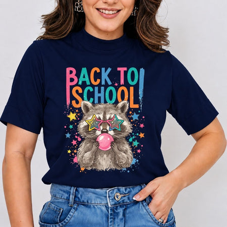 Front view mockup of a dark blue t-shirt featuring a colorful graphic of a raccoon blowing a pink bubblegum bubble, wearing star-shaped sunglasses under colorful "BACK TO SCHOOL" text.