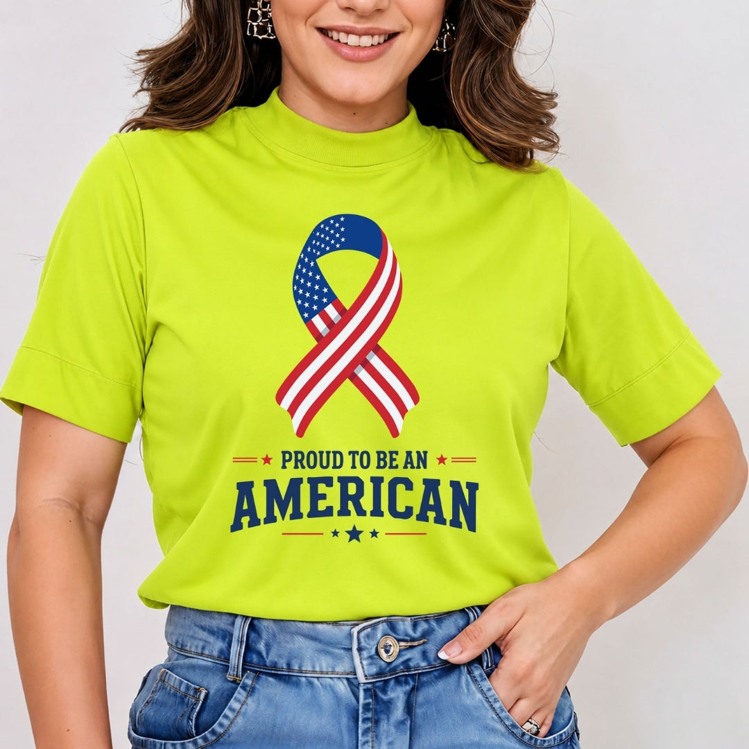 A close-up of a person wearing a hot pink t-shirt featuring an American flag ribbon graphic and the text "Proud to be an American."