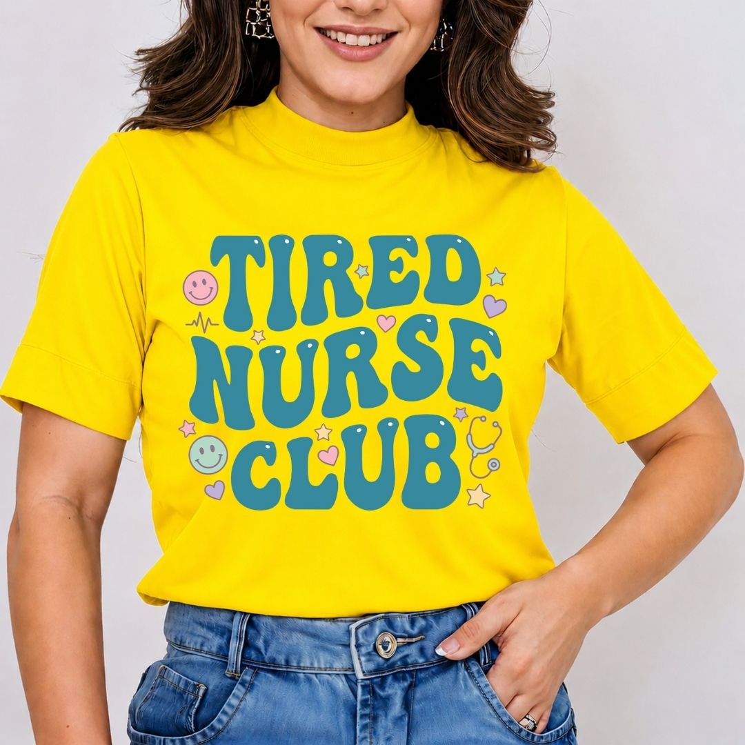Person wearing a yellow t-shirt with 'Tired Nurse Club' text and graphics.