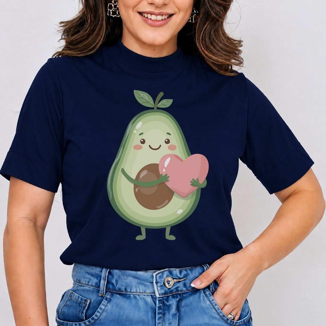 Person wearing a navy blue t-shirt with an avocado graphic holding a heart.