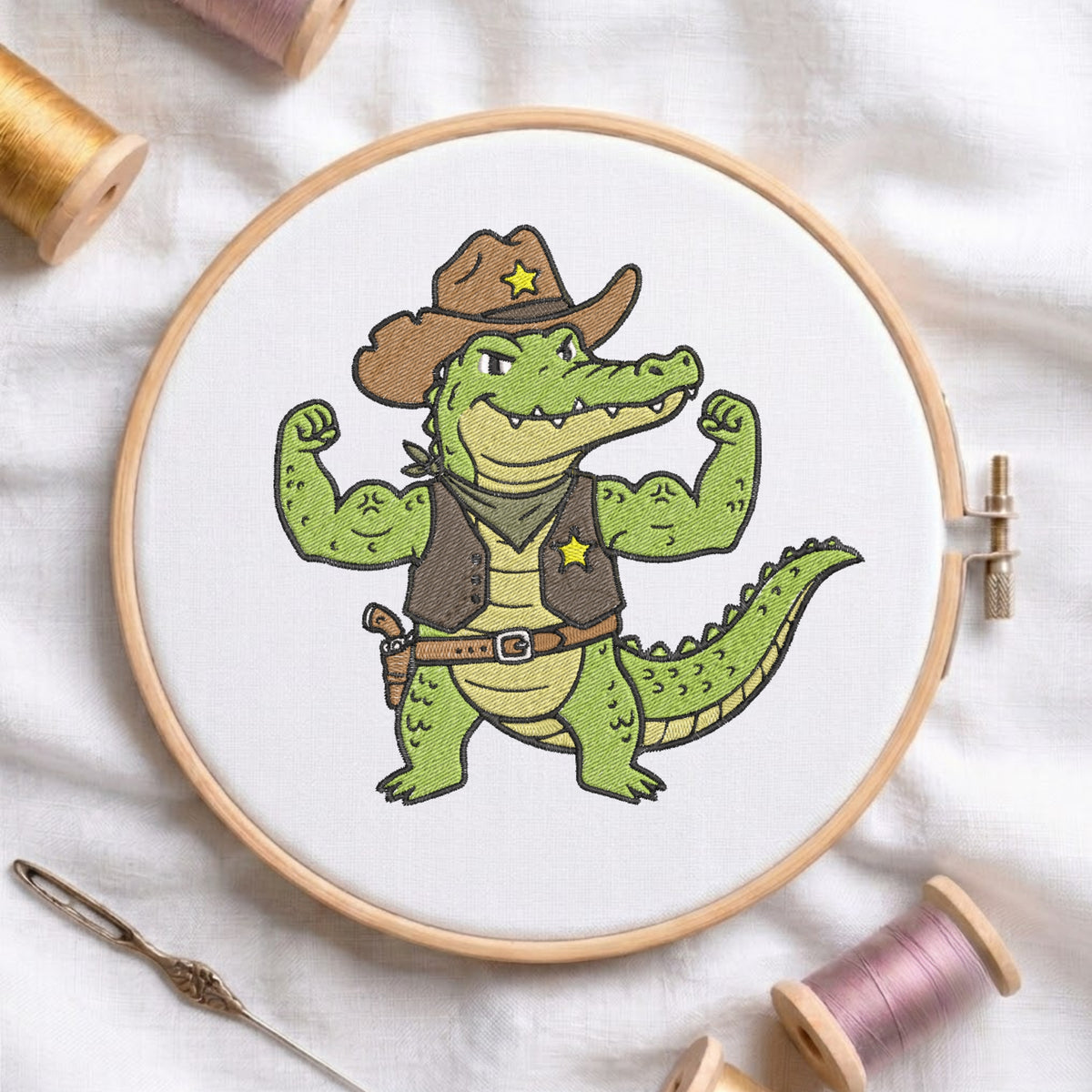 Muscular cowboy alligator embroidery design in a wooden hoop showing a green alligator sheriff flexing muscles wearing a hat and vest.