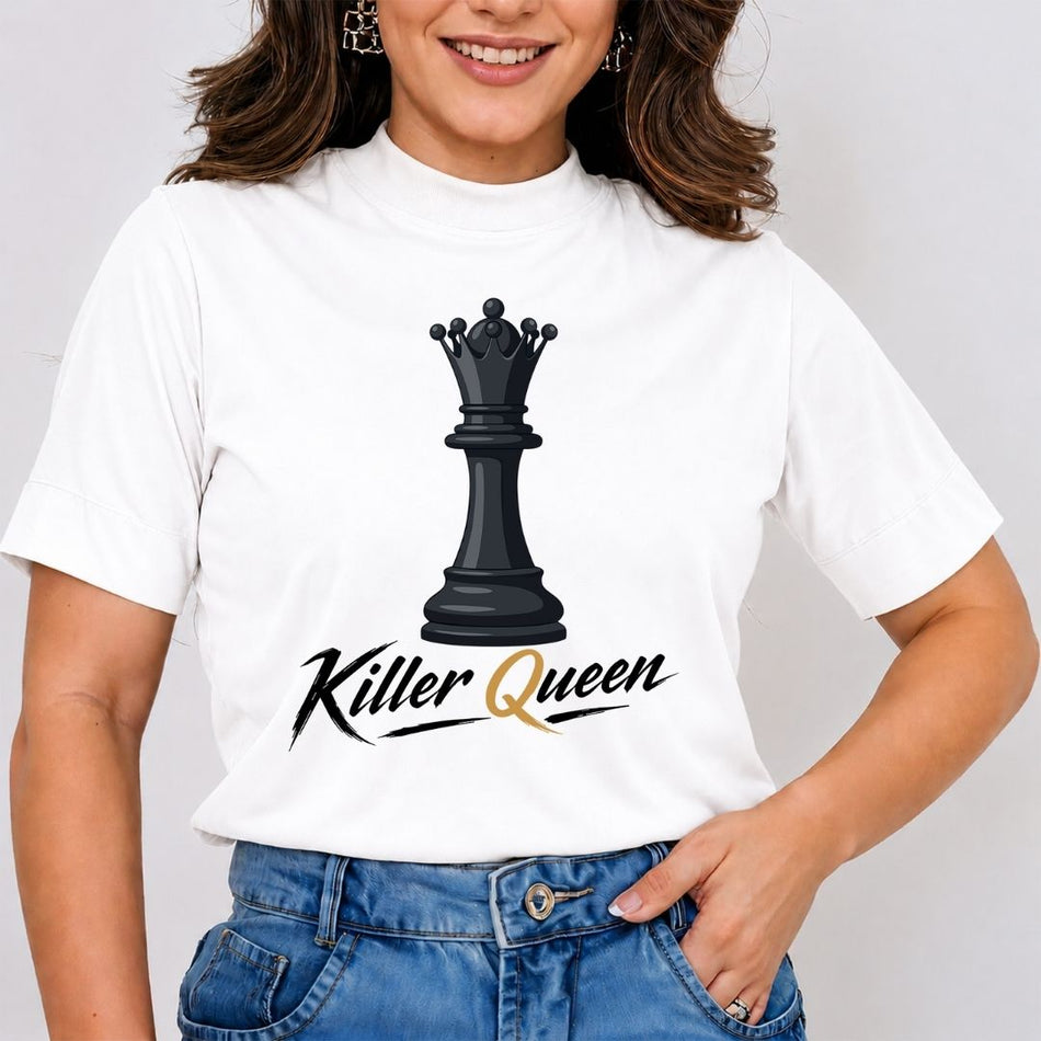 A woman wearing a white short-sleeve t-shirt with a black chess queen graphic and the words 'Killer Queen' printed on the front, paired with blue jeans.