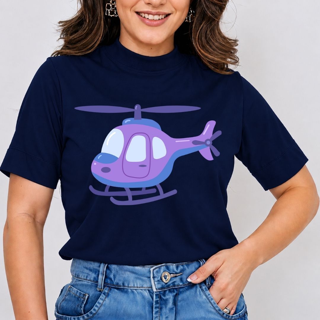 A woman wearing a navy blue short-sleeve t-shirt with a purple and light blue cartoon helicopter graphic on the front, paired with blue jeans.