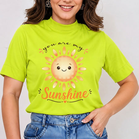 A person wearing a bright lime-green t-shirt featuring the happy cartoon sun graphic and the text "you are my Sunshine".