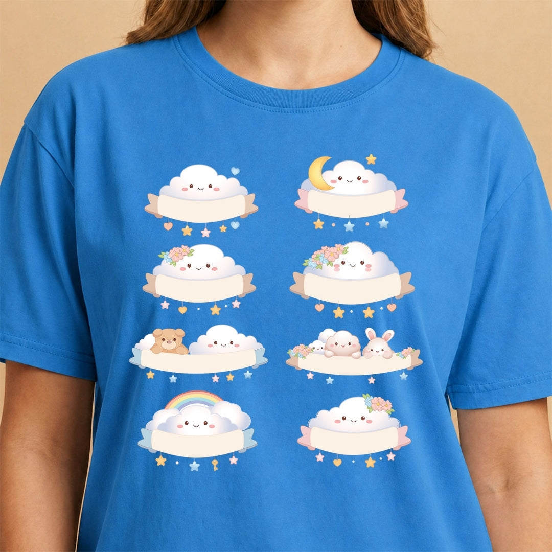 Person wearing a bright blue t-shirt featuring a graphic of eight cute, smiling kawaii clouds with blank banners, decorated with stars, moons, animals, and rainbows.