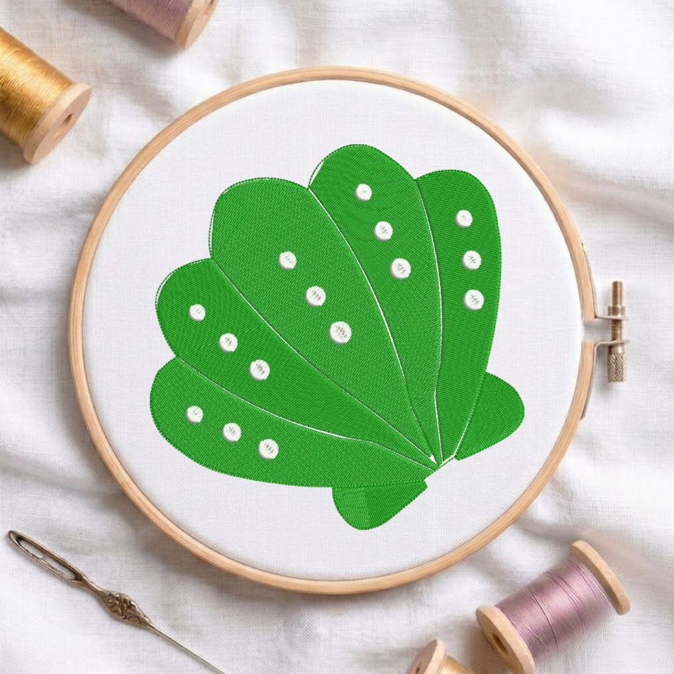 Green Scallop Seashell Embroidery Design in Wooden Hoop Mockup