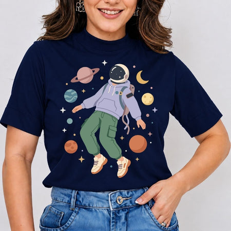 Person wearing a navy blue t-shirt with an astronaut graphic and space-themed design.