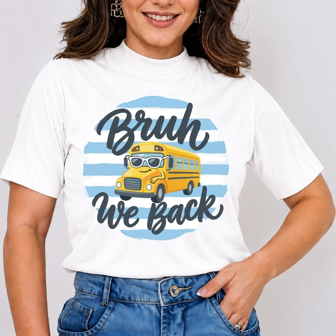 Person wearing a white t-shirt with a graphic of a school bus and text on a plain background
