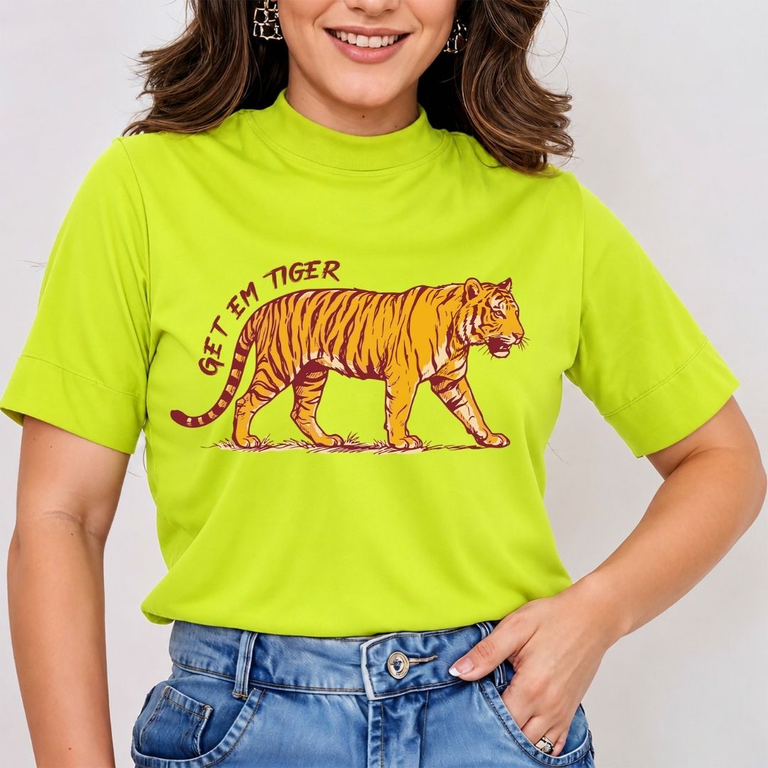 A smiling woman wearing a lime green mock neck t-shirt featuring a vintage orange tiger graphic with the text Get Em Tiger.