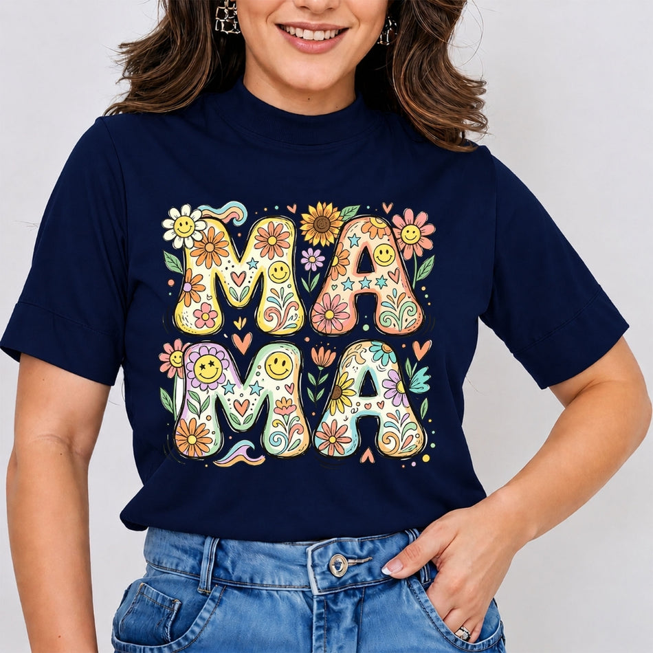 Woman wearing a navy blue mock neck t-shirt featuring a groovy 70s style "MAMA" stacked graphic design filled with vibrant retro sunflowers, daisies, and smiley faces.