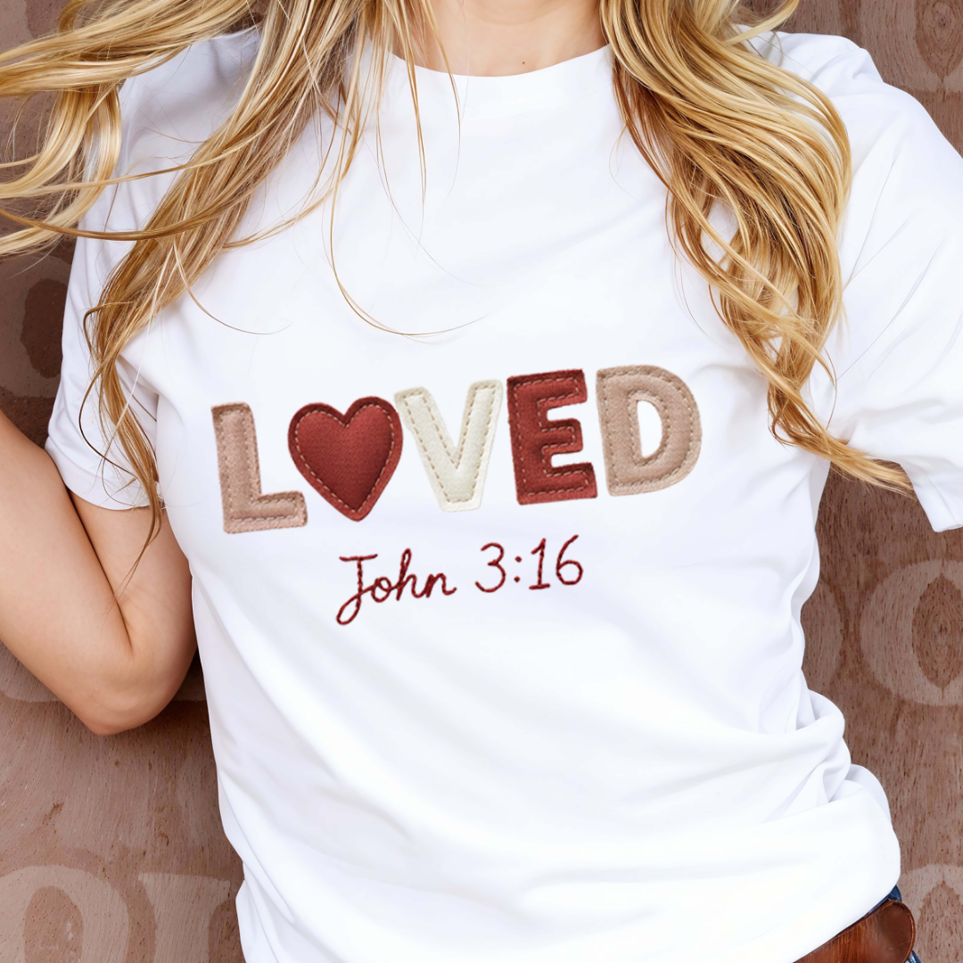 White t-shirt with 'LOVED John 3:16' text and heart design.