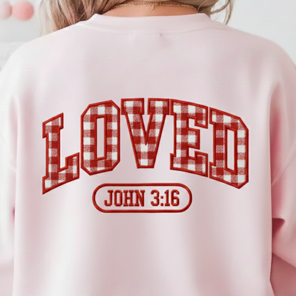 Pink sweatshirt with 'LOVED JOHN 3:16' text on the back