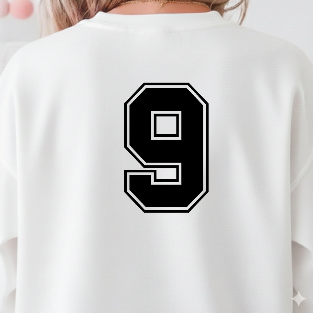 White sweatshirt with black number 9 on the back