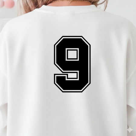White sweatshirt with black number 9 on the back