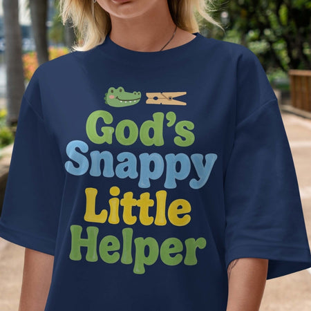Person wearing a navy blue t-shirt with colorful text and graphic design.