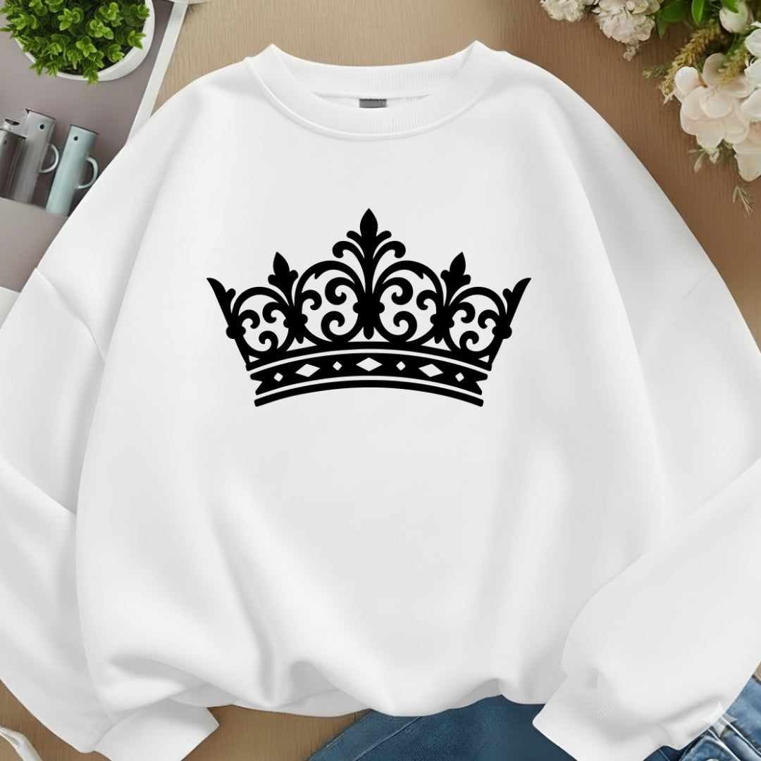 White sweatshirt with a black crown design on a neutral background