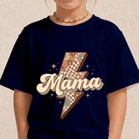 A child wearing a navy blue t-shirt with a graphic design featuring a lightning bolt filled with a checkerboard and floral pattern, and the word 'Mama' in retro cream bubble letters with a blue outline.