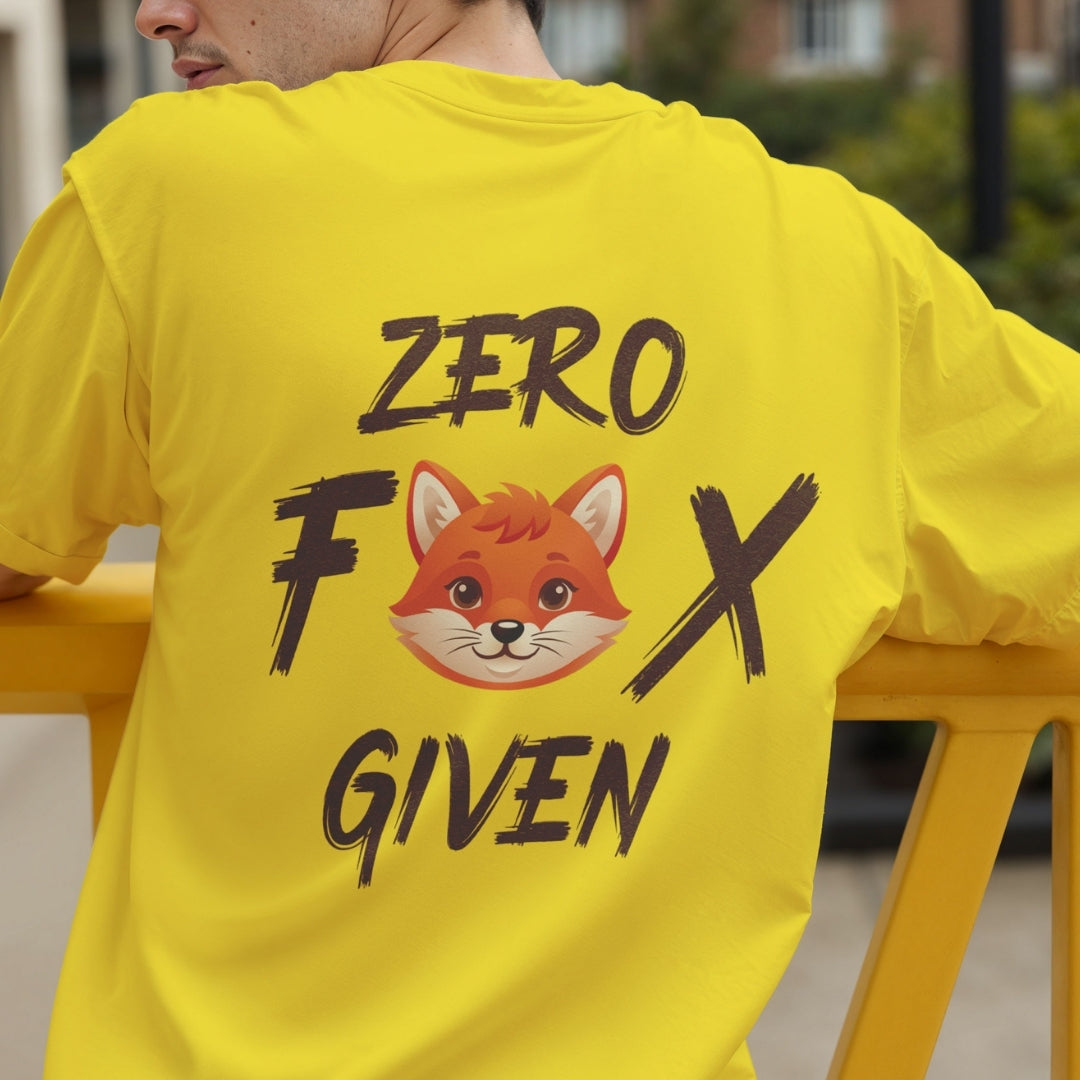 Back view of a person wearing a bright yellow t-shirt featuring a cute fox face illustration and witty Zero Fox Given text.