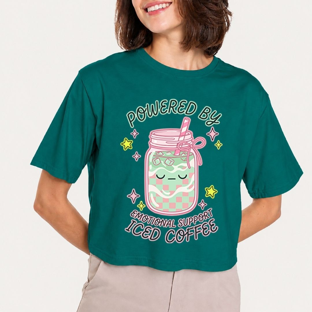 Person wearing a teal t-shirt with a graphic design and text.