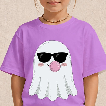 Young girl wearing a light purple t-shirt printed with a cute Halloween ghost graphic wearing sunglasses blowing a pink bubble.