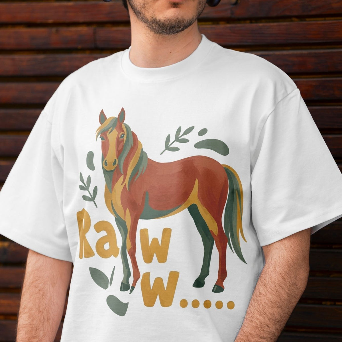Close up of a man wearing a white t-shirt showing a large, earth-toned watercolor horse sublimation print on the front.