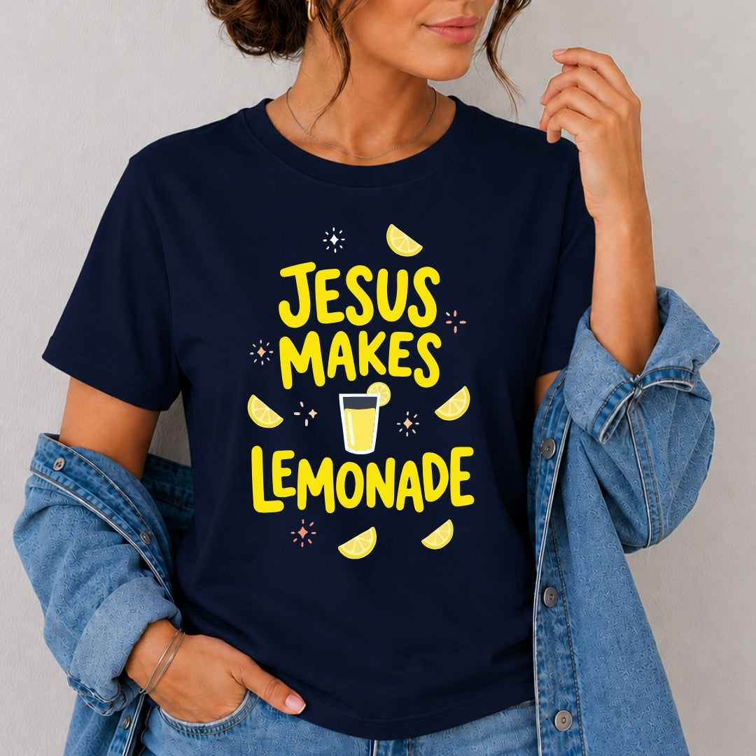 Person wearing a navy blue t-shirt with 'Jesus Makes Lemonade' text and graphics.