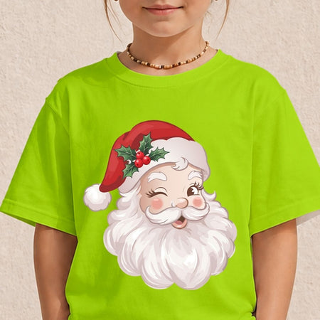A child wearing a bright lime green t-shirt with a cartoon graphic of a winking Santa Claus with a red hat and white beard, set against a neutral textured wall.