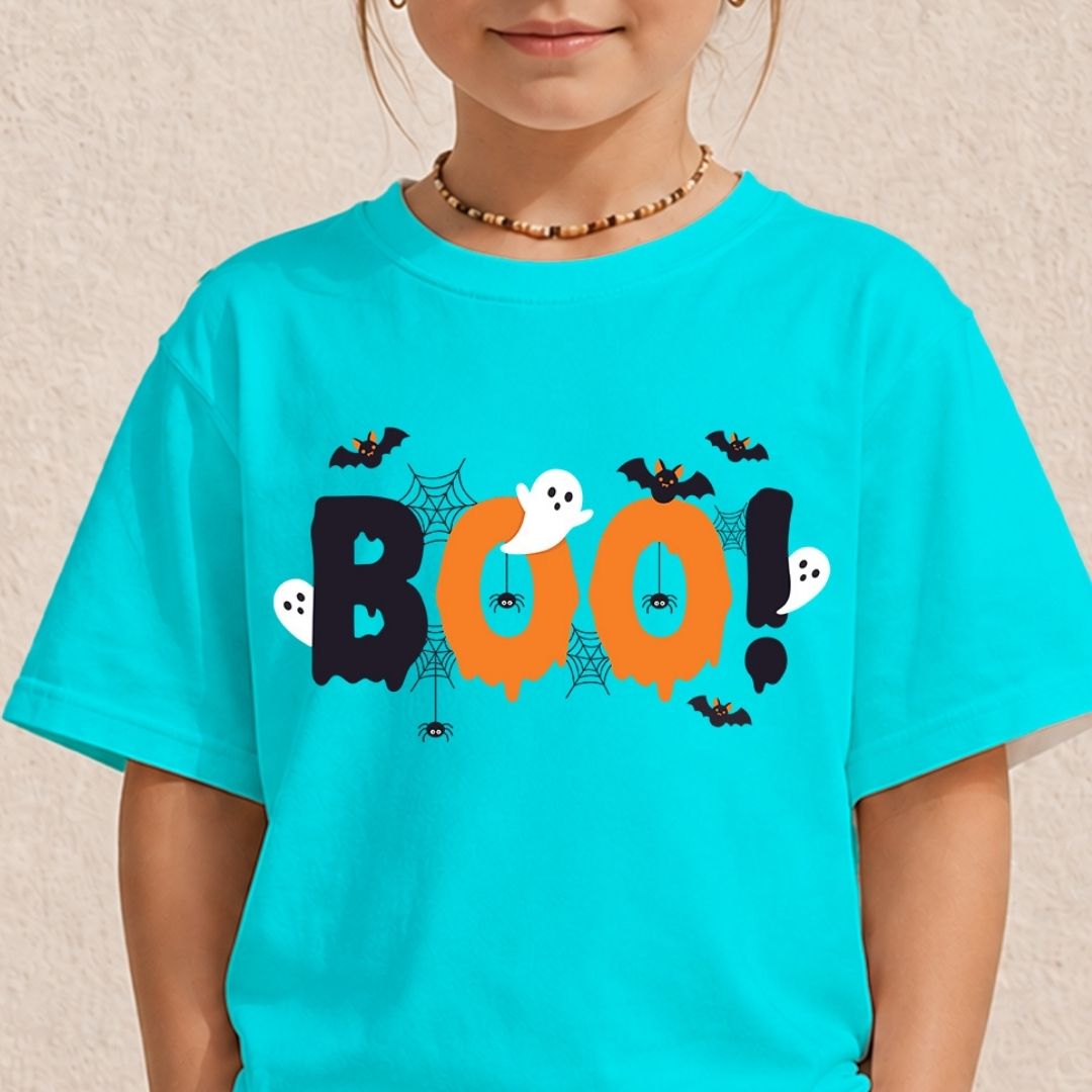 Child wearing a bright blue t-shirt with a cute Halloween "BOO!" ghost and spiderweb sublimation graphic.