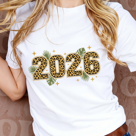 White t-shirt with '2026' design featuring leopard print and green leaves, worn by a person.