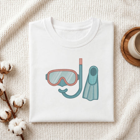 Canvas tote bag featuring a stitched snorkel gear embroidery design held in a bright, modern room setting.