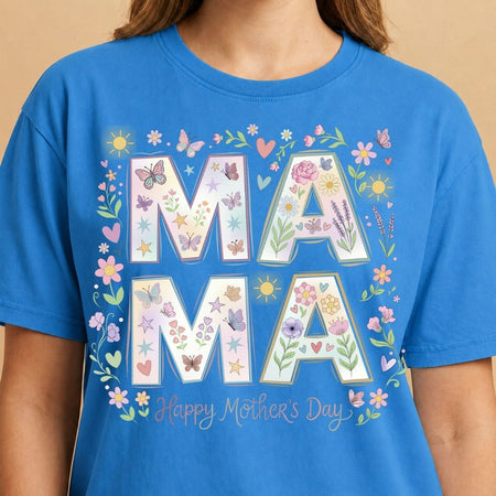 Blue t-shirt with floral 'MAMA' design and 'Happy Mother's Day' text on a beige background