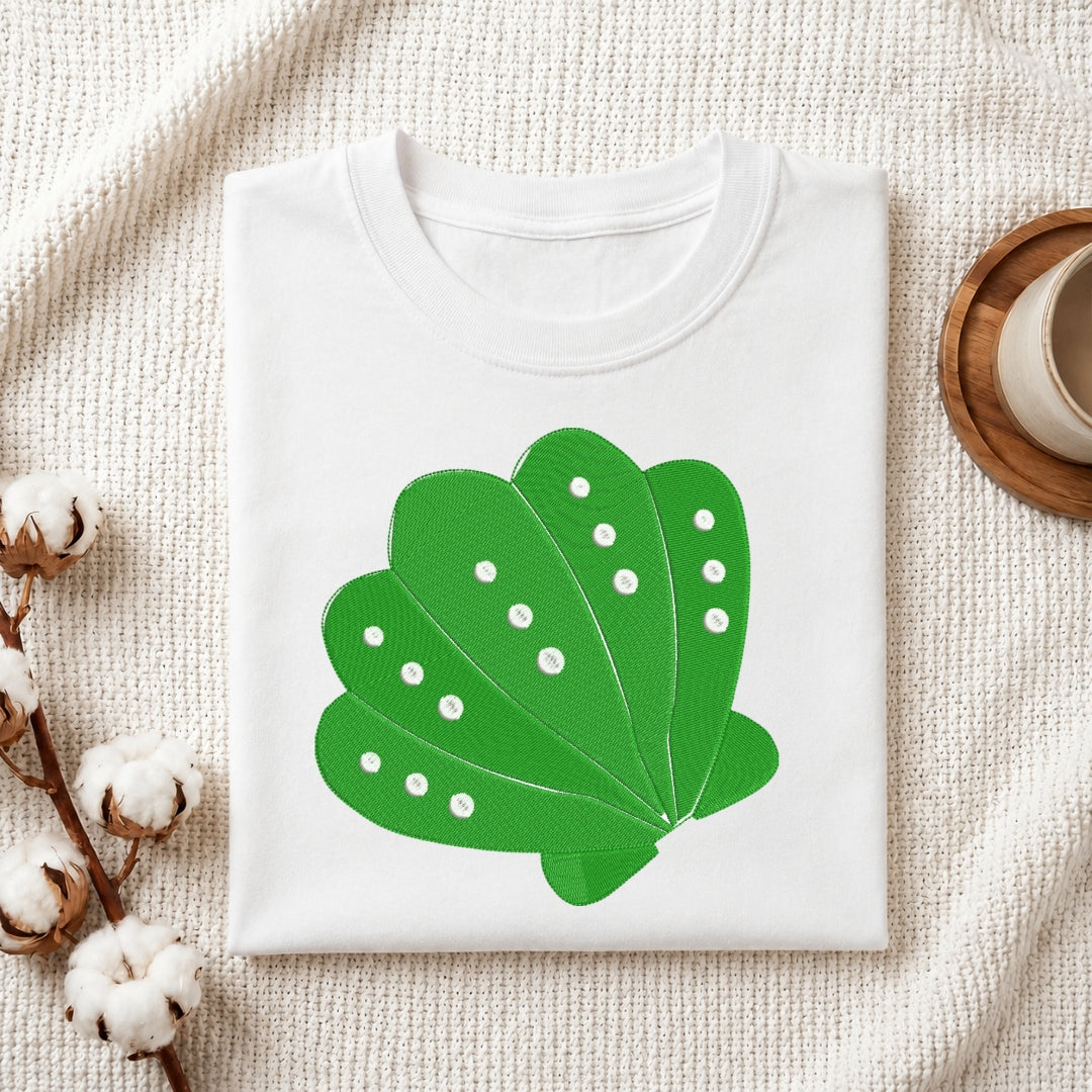 Green Seashell Graphic Print on Folded White T-Shirt