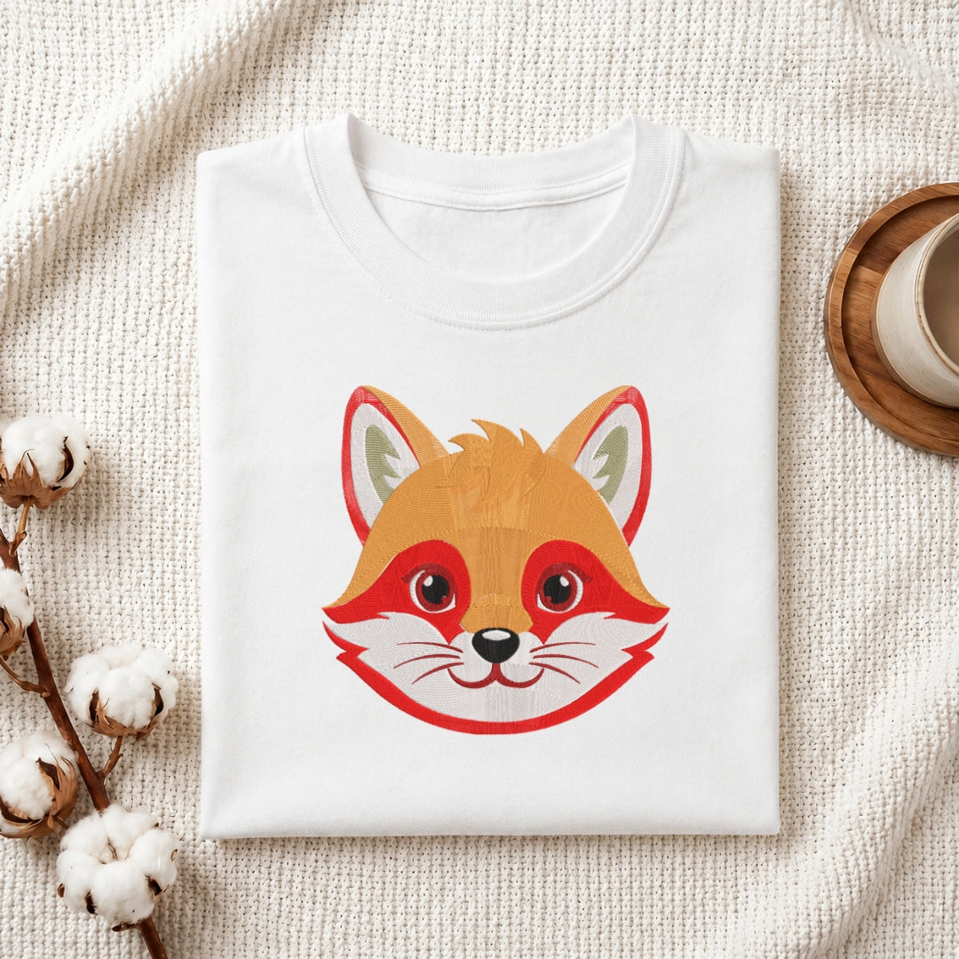 A white t-shirt featuring an embroidered design of a fox's face.