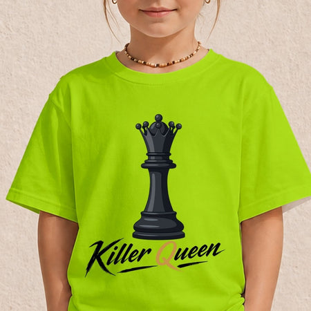 A child wearing a bright neon yellow-green t-shirt with a black chess queen graphic and the words 'Killer Queen' printed on the front, set against a textured beige wall.
