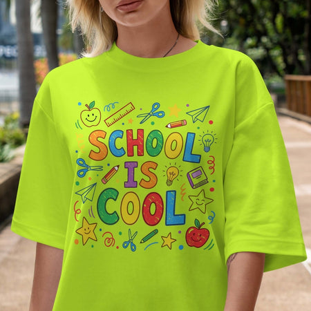 Person wearing a bright green t-shirt with 'School is Cool' text and graphics.