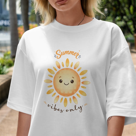 Person wearing a white t-shirt with a sun graphic and 'Summer vibes only' text.