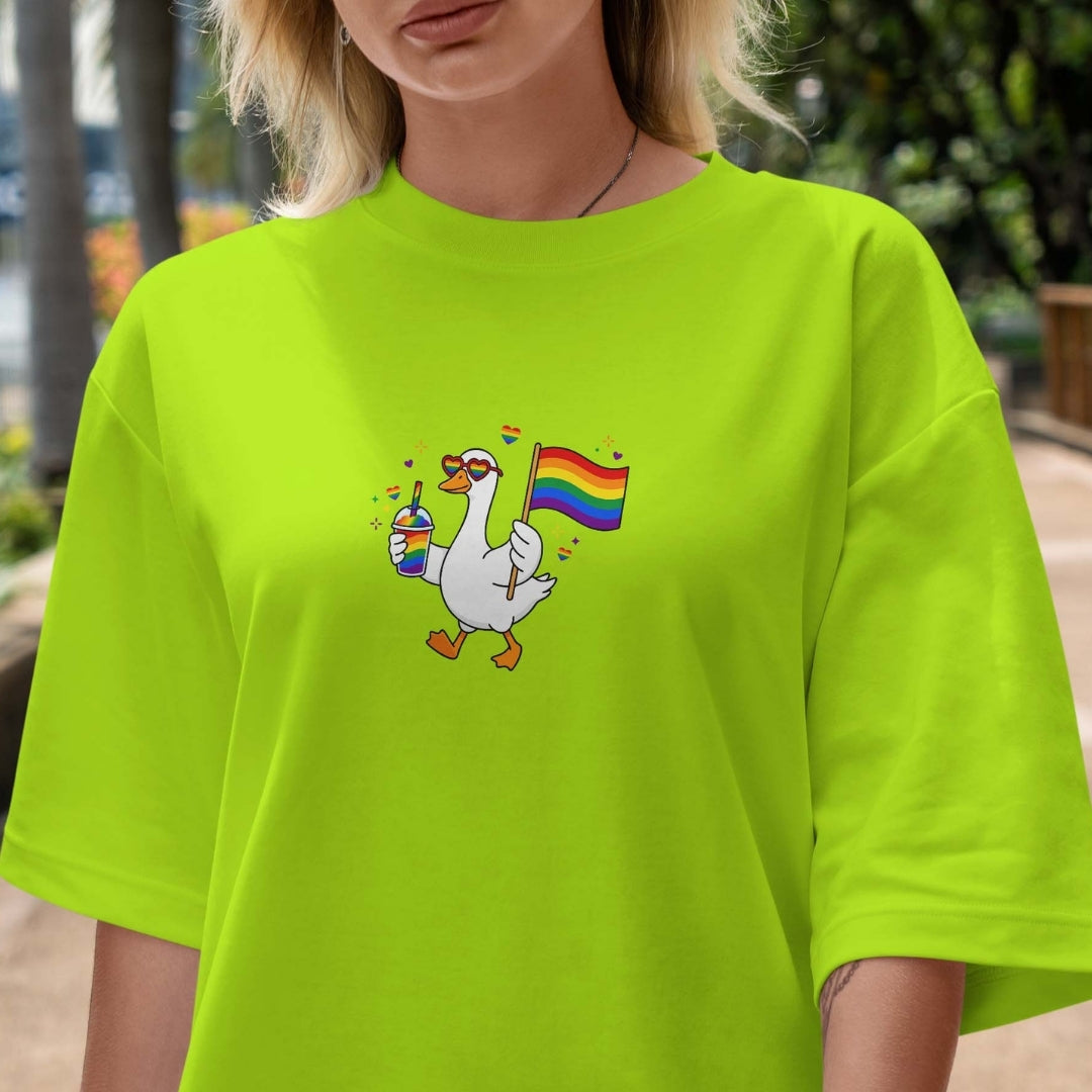 Person wearing a bright green t-shirt with a colorful graphic design.
